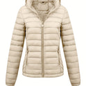 Black Isla lightweight quilted hooded puffer jacket with fleece lining from Lumina Wear, shown on a model.