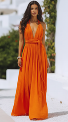 Orange Isla V Neck Halter Pleat Maxi Dress by Lumina Vancouver, featuring a flowing silhouette and elegant pleated design.
