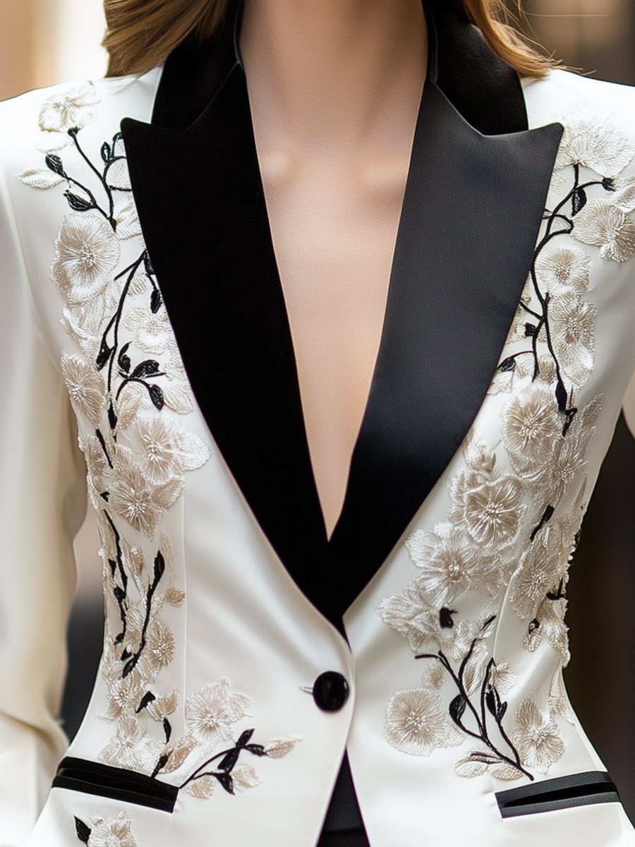 Ivory satin blazer by Lumina Vancouver, tailored fit with sleek lapels and long sleeves, styled on a mannequin.