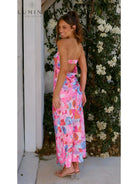 Red Jacyntha strapless summer chic dress by Lumina Vancouver, perfect for wedding guests, size 8-10, styled for warm weather.