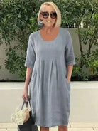 Blue loose dress with pockets by Lumina Vancouver, featuring a relaxed fit and casual style, perfect for everyday wear.