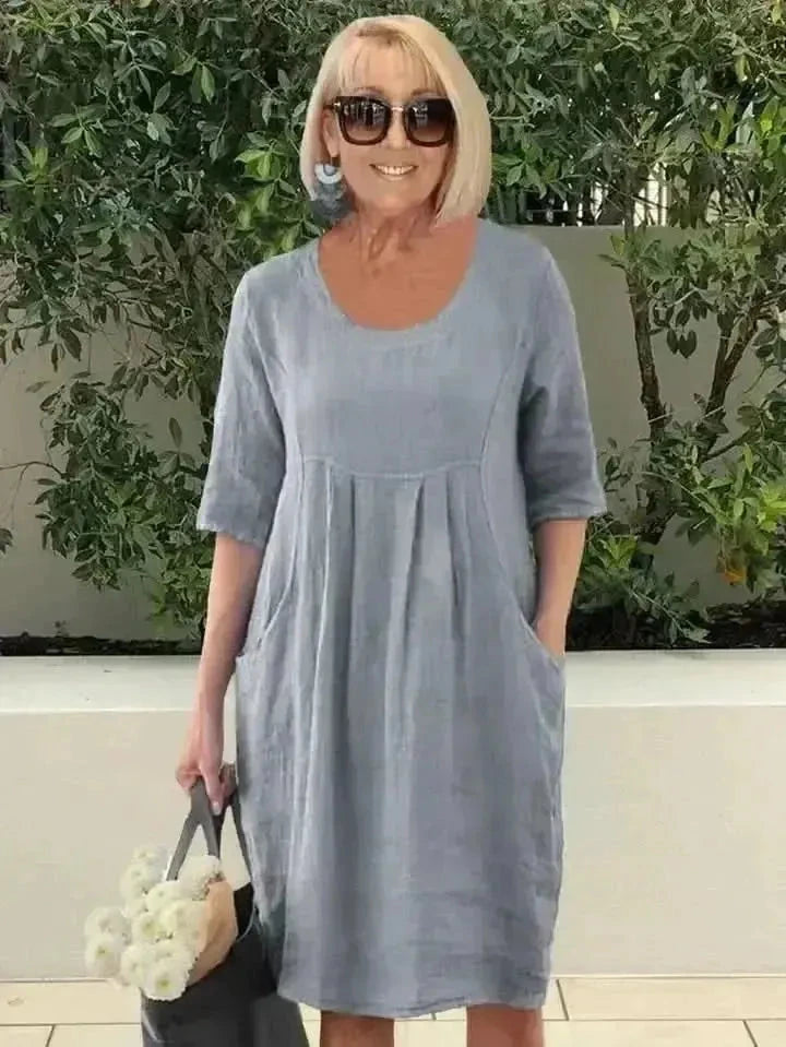 Blue loose dress with pockets by Lumina Vancouver, featuring a relaxed fit and casual style, perfect for everyday wear.