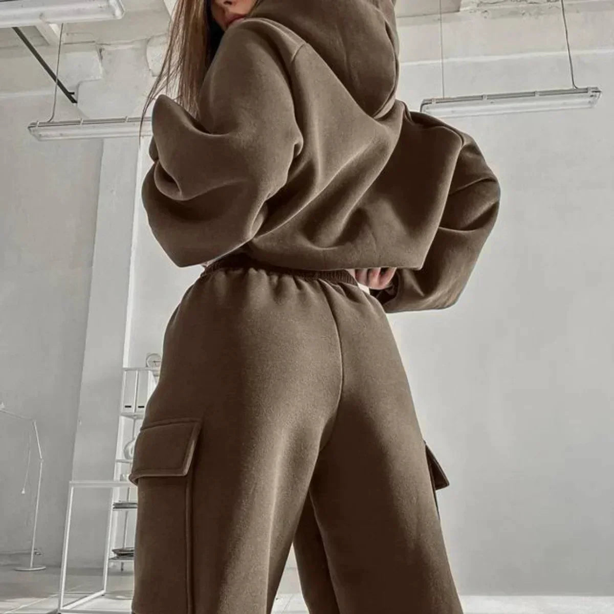 Jasmine relaxed fit cargo pocket hoodie and sweatpants set by Lumina Wear, shown in black with casual, comfortable style.