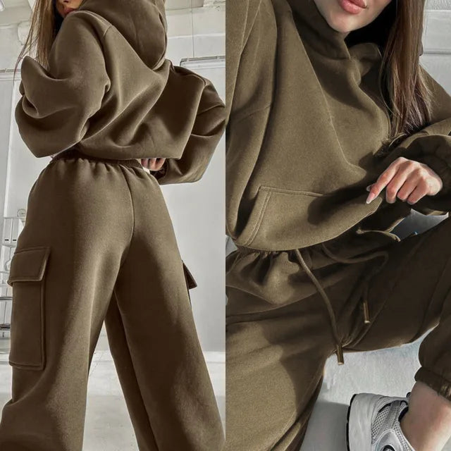 Black Jasmine Lumina Wear relaxed fit cargo pocket hoodie and sweatpants tracksuit set, shown on a model.
