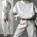 Black Jasmine Lumina Wear relaxed fit cargo pocket hoodie and sweatpants set, showing the comfortable, casual tracksuit design.
