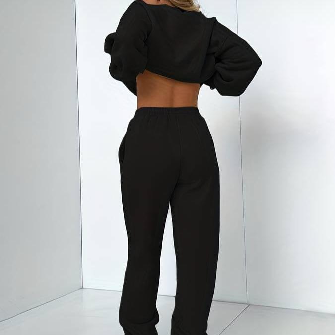 Black Jenna minimalist sweat set with jogger pants from Lumina Wear, featuring a relaxed fit and comfortable fabric.