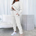 Black Jenna relaxed minimalist sweat set with jogger pants from Lumina Wear, featuring a comfortable, casual fit.