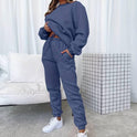 Black Jenna relaxed minimalist sweat set with jogger pants from Lumina Wear, casual and comfortable loungewear ensemble.
