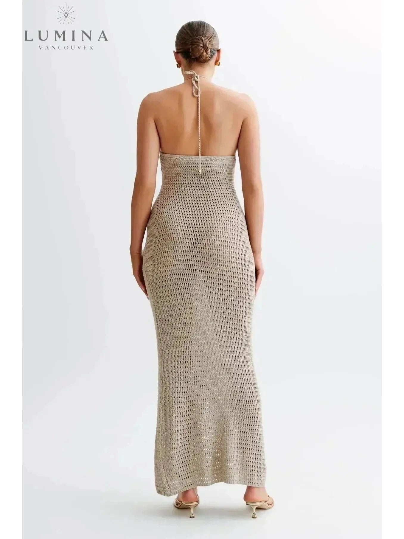Beige Jolie summer dress by Lumina Vancouver, perfect for holiday vibes, shown on a model with flowing fabric and casual style.