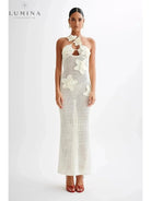 Beige Jolie summer dress by Lumina Vancouver with holiday vibes, featuring a flowy fabric and stylish design for warm-weather wear.
