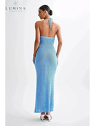 Beige Jolie summer dress by Lumina Vancouver with a relaxed holiday vibe, perfect for warm-weather occasions.