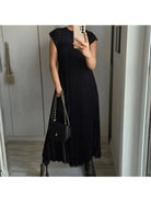 Beige Honorine elegant classy dress by Lumina Vancouver, featuring a sophisticated design perfect for formal occasions.