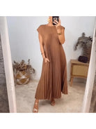 Beige Honorine elegant and classy dress by Lumina Vancouver, showcasing a stylish, sophisticated design perfect for formal occasions.