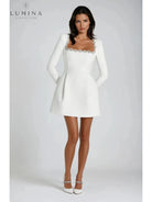 Black Garance Mini Dress from Lumina Vancouver's Isabeau Collection, perfect as a stylish wedding guest dress.