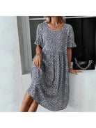 Blue floral printed casual dress by Lumina Vancouver, featuring a relaxed fit and stylish design.