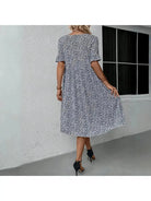Blue Juliet casual floral printed dress by Lumina Vancouver, featuring a relaxed fit and vibrant floral pattern.