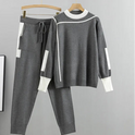 Red Kaitlyn Lumina Wear relaxed chic lounge set with modern accents, comfortable loungewear for stylish relaxation.