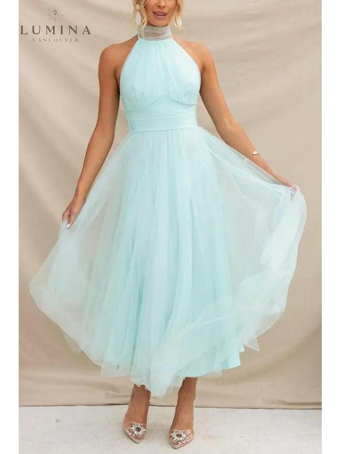 Kaylee cream fairy wedding guest dress by Lumina Vancouver, in size 6-8, with delicate fairy-inspired design and flowing fabric.