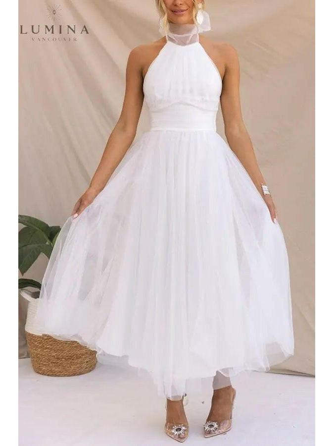Kaylee fairy evening dress in creme by Lumina Wear, featuring delicate details, suitable for wedding guests or special occasions.