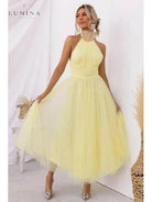 Cream-colored Kaylee fairy dress by Lumina Vancouver, perfect for wedding guest attire, featuring delicate fairy-inspired design.