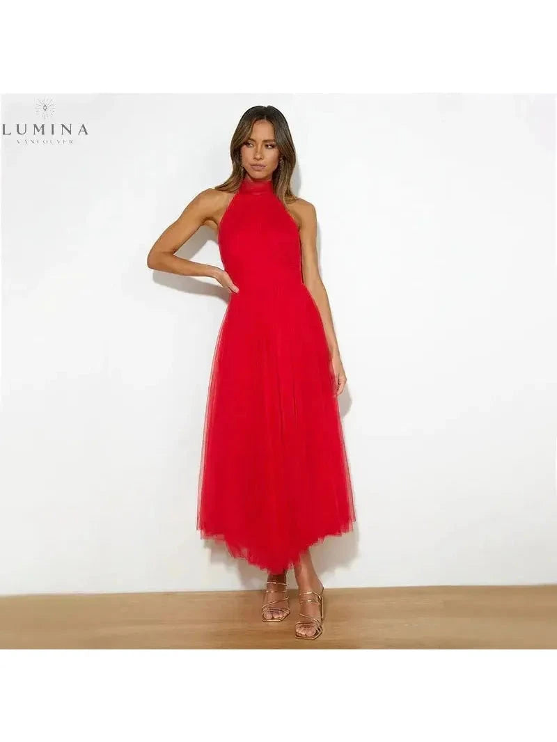 Kaylee fairy dress in crème for wedding guests by Lumina Vancouver, featuring a delicate, flowing design perfect for special occasions.