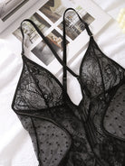 Lumina Vancouver Keira's Bodysuit, stylish fitted bodysuit with long sleeves and scoop neckline, in black fabric.