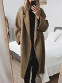 Kelly Lumina Wear women's winter long coat in grey, showcasing a stylish and warm classic coat design for cold weather.