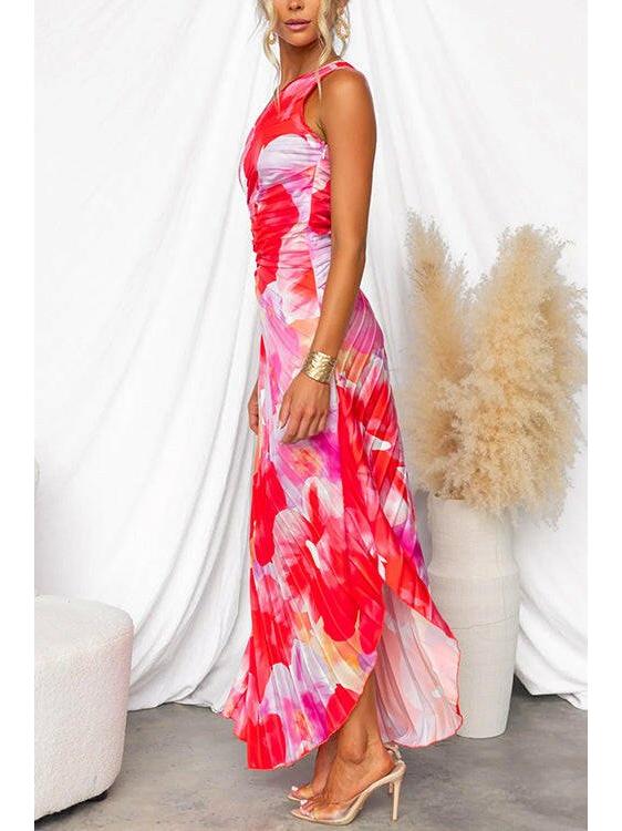 Red Kelsey pleated summer dress by Lumina Vancouver, perfect for wedding guests, shown on a model.