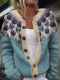Light blue Keysha cardigan with floral pattern by Lumina Wear, showcasing its soft knit fabric and intricate floral design.