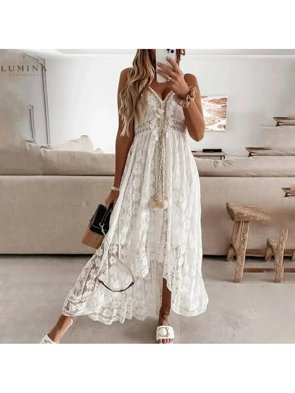 Manon beige boho dress by Lumina Vancouver, perfect for holiday vibes, featuring flowing fabric and elegant design.