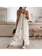 Manon beige boho dress by Lumina Vancouver, perfect for holiday vibes, featuring flowing fabric and elegant design.