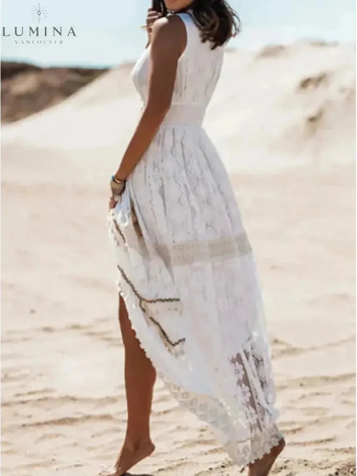 Beige Manon elegant boho dress by Lumina Vancouver, featuring flowing fabric and holiday-inspired style perfect for festive occasions.