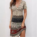 Green Kira mini dress by Lumina Wear featuring relaxed fit and patchwork boho style, shown on a model.