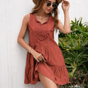 Rust red women's mini dress with lace details from Lumina Wear, featuring a fitted silhouette and stylish design.