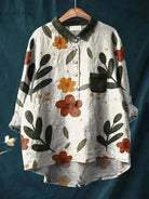 Gray Koda Botanic Art Tee by Lumina Vancouver, featuring botanical print on soft fabric, worn casually.