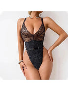 Lumina Vancouver Kristina's Bodysuit in black, form-fitting with long sleeves, showcased on a model.