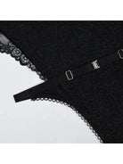 Kristina's Lumina Vancouver bodysuit in black, form-fitting with long sleeves and a scoop neckline, displayed on a mannequin.