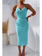 Blue Laura strapless wedding guest dress by Lumina Vancouver, elegant sleeveless gown with fitted bodice and flowing skirt.