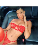 Black Lauren 2-piece Italian lingerie set by Lumina Wear, featuring lace bras and matching panties on a smooth surface.