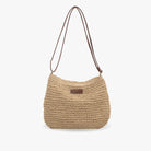 Chic beige straw shoulder bag by Lumina Wear with vegan leather accents and a stylish, compact design.