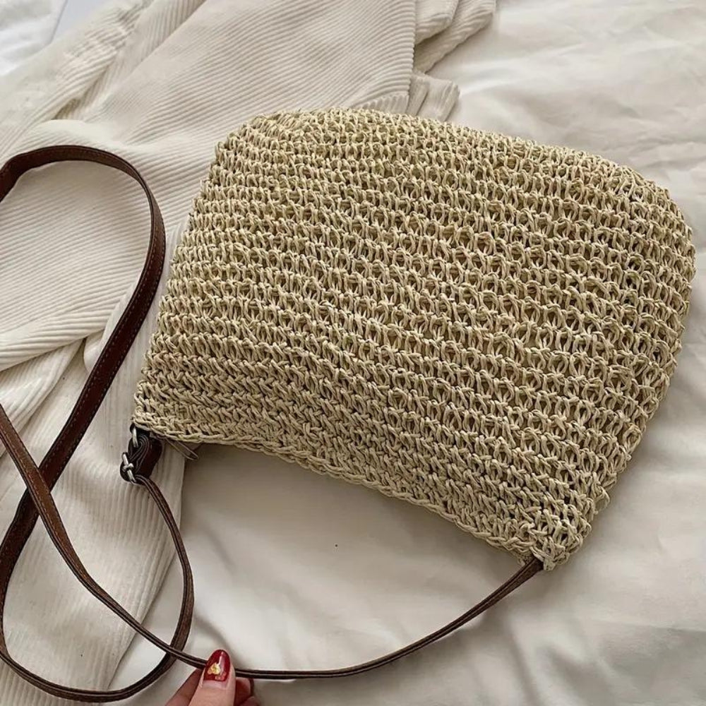 Léandre beige straw shoulder bag with vegan leather accents from Lumina Wear, stylish handbag with top handle and adjustable strap.