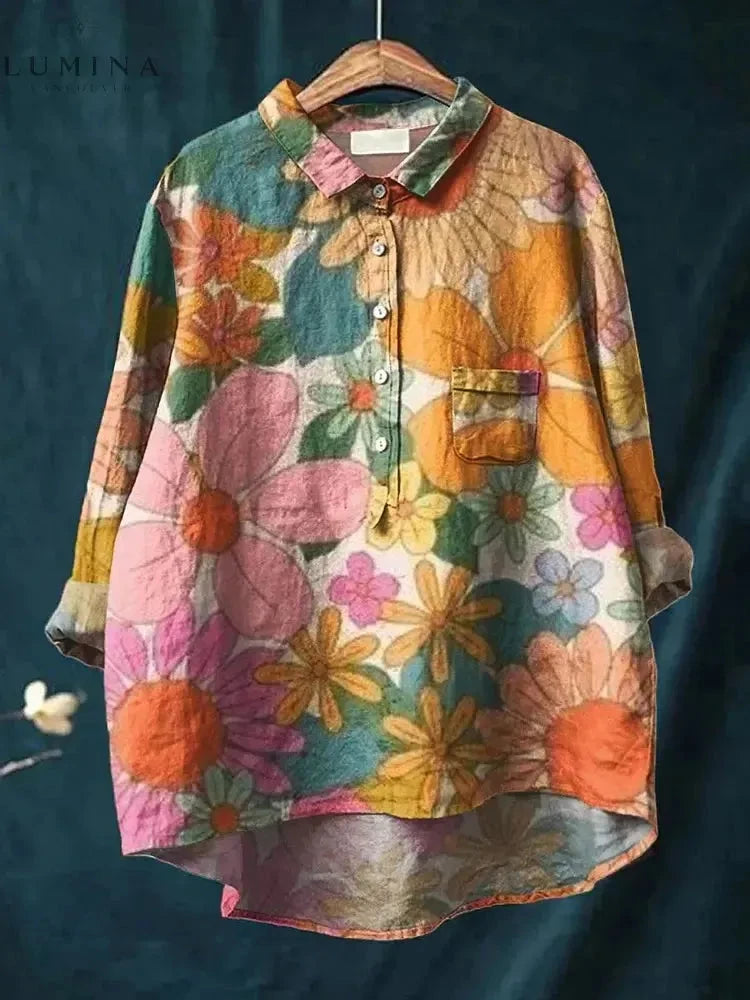 Leila flower print shirt by Lumina Vancouver featuring vibrant orange and pink floral pattern on lightweight fabric.