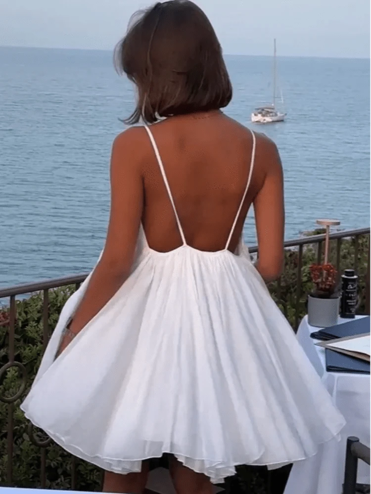 LENA™ elegant dress by Lumina Vancouver featuring a flowy design and sophisticated style, perfect for formal occasions.