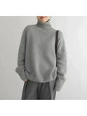 Beige Lena turtleneck sweater by Lumina Wear, featuring a cozy knit design and a comfortable, one-size fit.