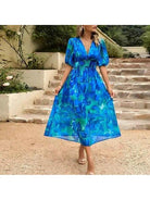 Blue Leona elegant midi dress by Lumina Vancouver, perfect for wedding guests, featuring a stylish and sophisticated design.