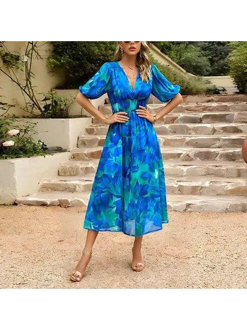 Blue Leona elegant midi dress by Lumina Vancouver, perfect for wedding guest occasions, shown on a size 8 model.