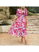 Blue Leona elegant midi dress by Lumina Vancouver, perfect for wedding guests, shown on a model.
