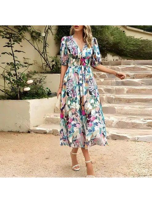 Blue Leona elegant midi dress by Lumina Vancouver, perfect wedding guest dress with a stylish, flowing silhouette.