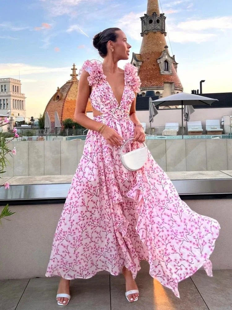 Light pink Lexi backless ruffles maxi dress by Lumina Vancouver, flowing elegant evening dress with ruffled details and a backless design.