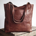 Lila Lumina Wear elegant city handbag in chestnut brown with smart storage compartments, versatile and stylish for everyday use.